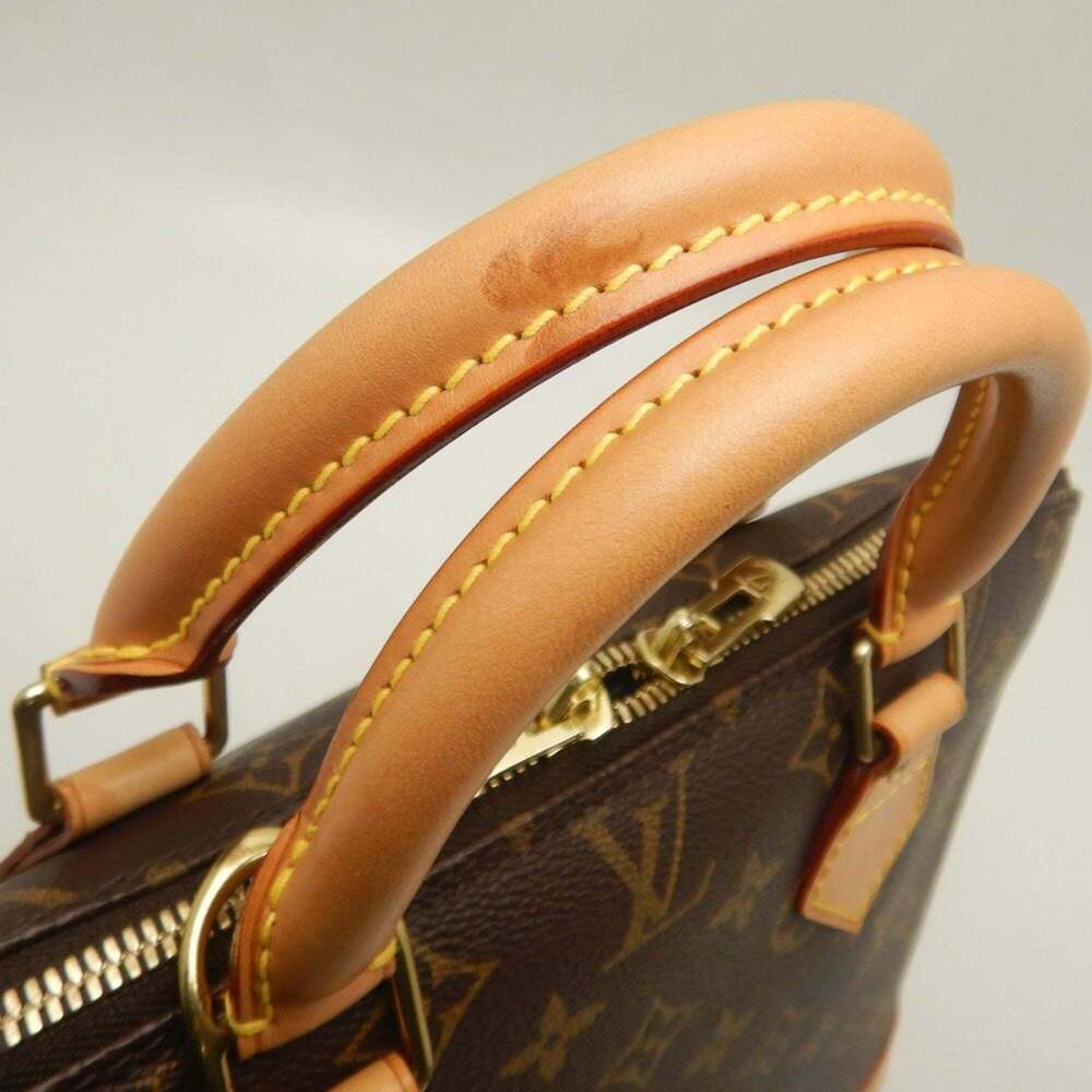 LOUIS VUITTON Authentic Brown Monogram Alma Bag - Picture 9 of 16